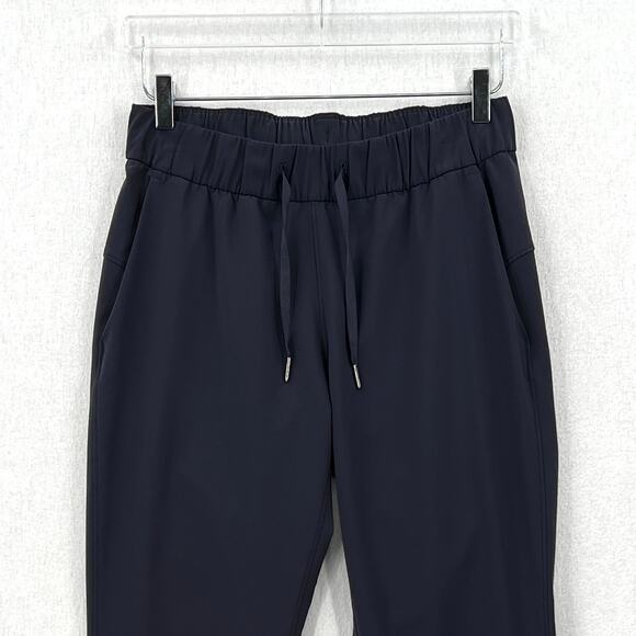 LULULEMON On The Fly Woven 27" Pants Womens 6 Dark Navy Cropped Slim Straight - Picture 3 of 14